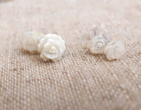 Small post earrings with mother of pearl white rose.