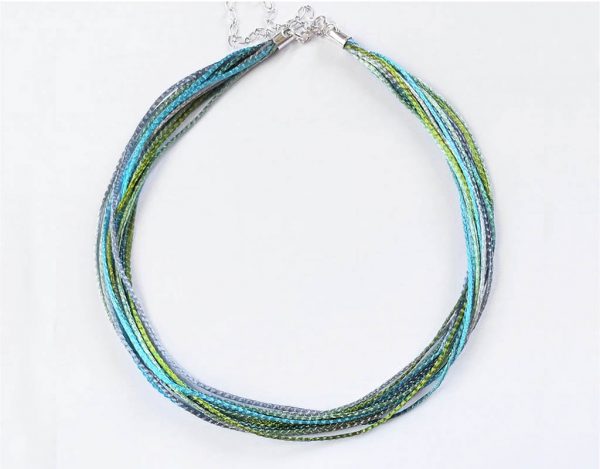 Multistrand necklace in blue, green and turquoise colors
